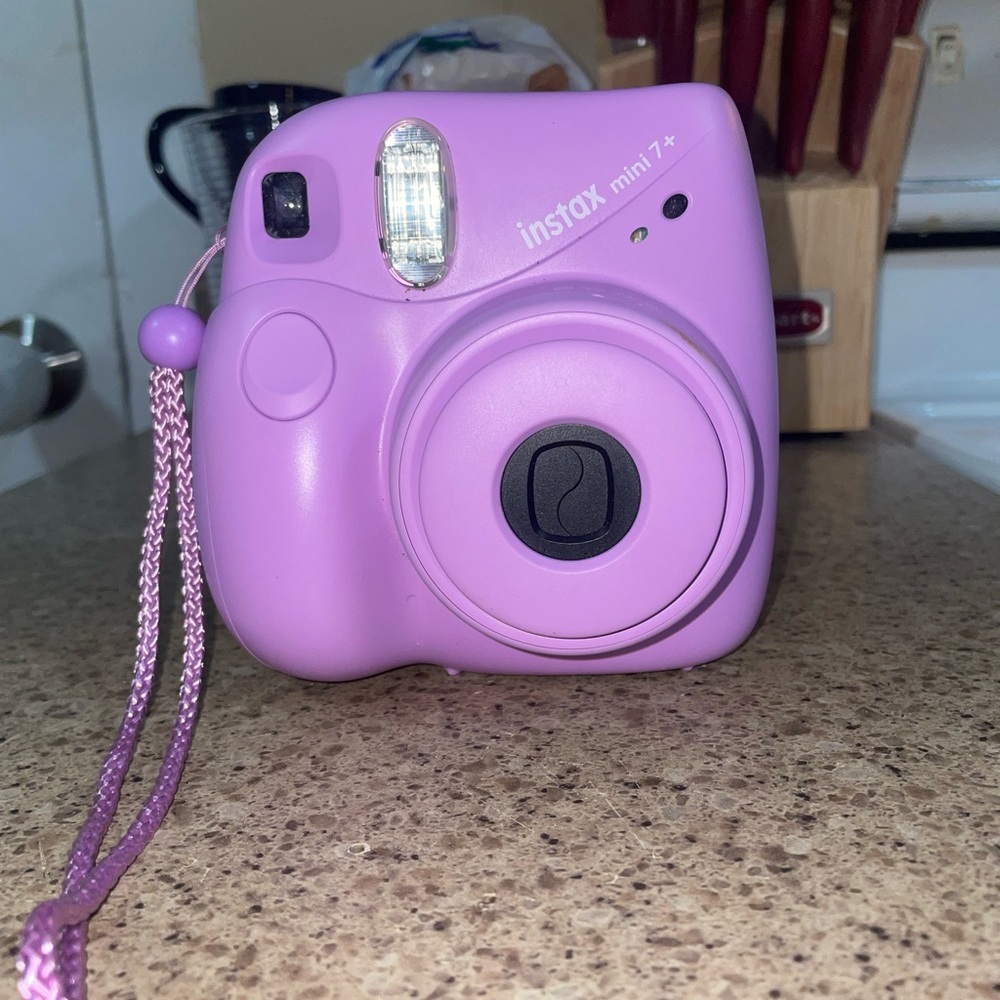 Instax mini 7+ lavender 

Instax mini lavender chevron case with arm strap